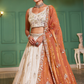 Elegant Tissue Lehenga Choli with Sequins and Thread Embroidery and Matching Dupatta