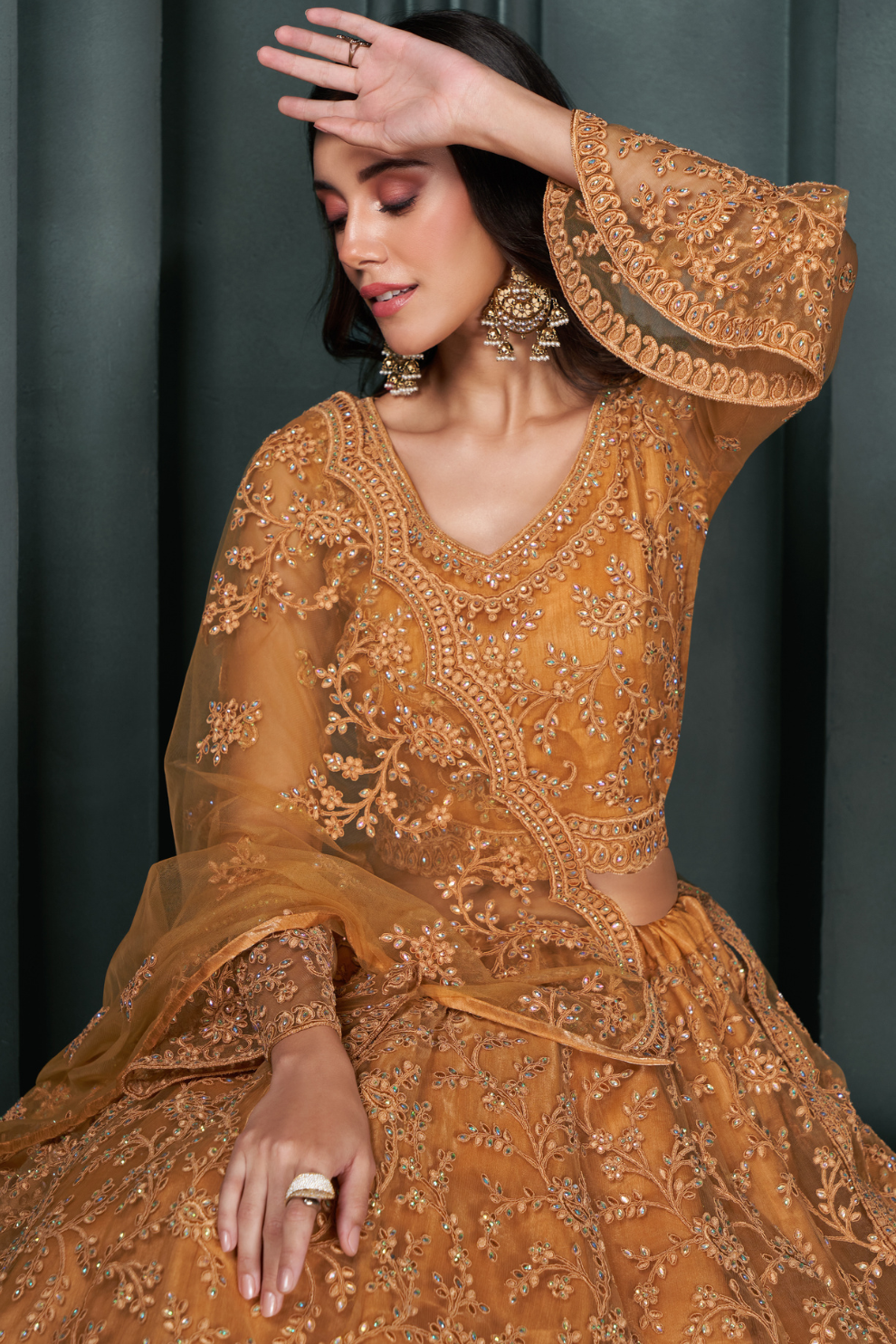 Gold Net Lehenga With Intricate Embroidery For Special Occasions