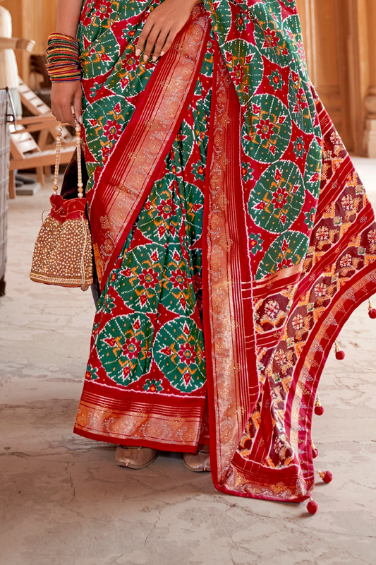 Artisanal Patola Silk Saree with Elegant Tassel Touch