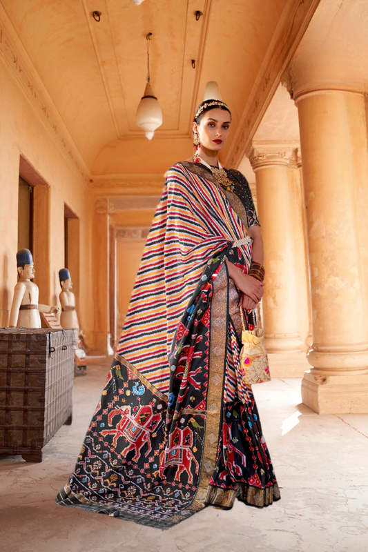 Artisanal Patola Silk Saree with Elegant Tassel Touch