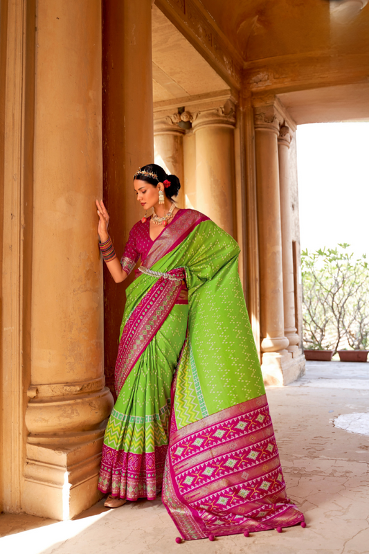 Artisanal Patola Silk Saree with Elegant Tassel Touch