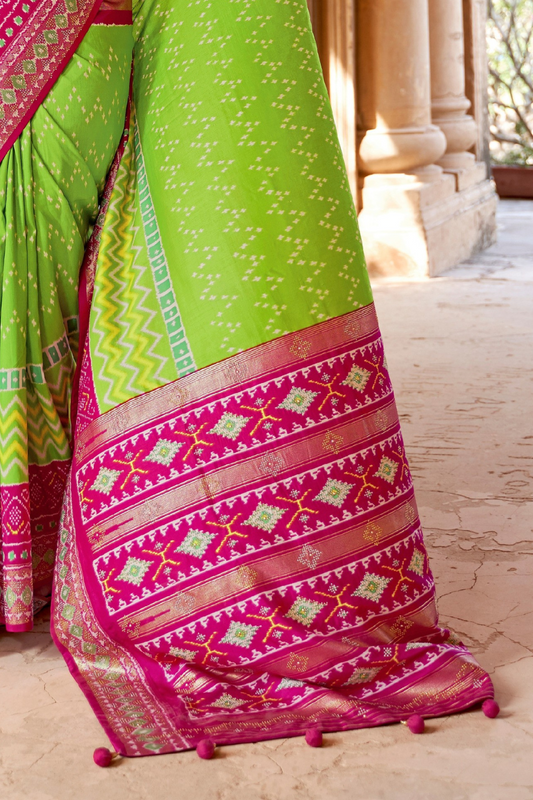 Artisanal Patola Silk Saree with Elegant Tassel Touch