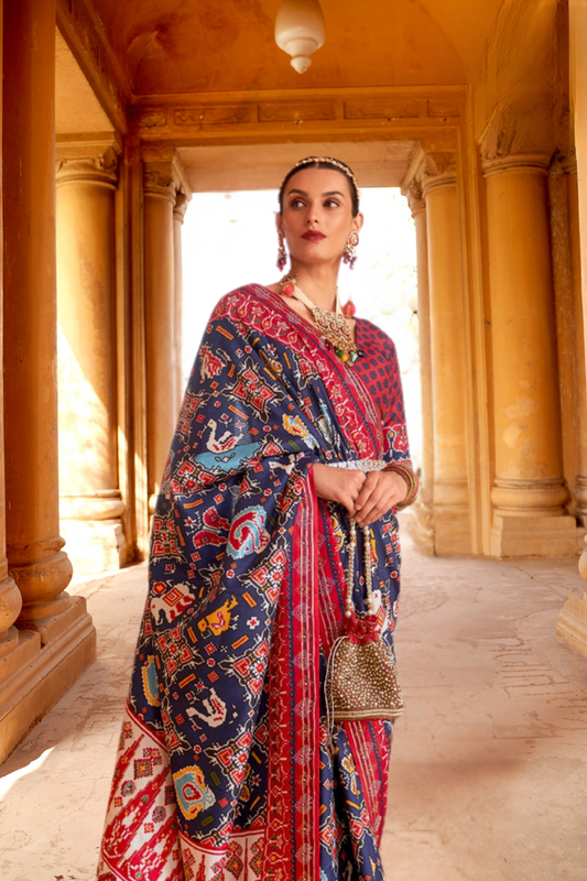 Artisanal Patola Silk Saree with Elegant Tassel Touch