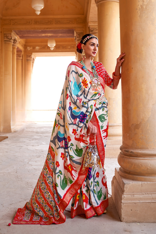 Artisanal Patola Silk Saree with Elegant Tassel Touch