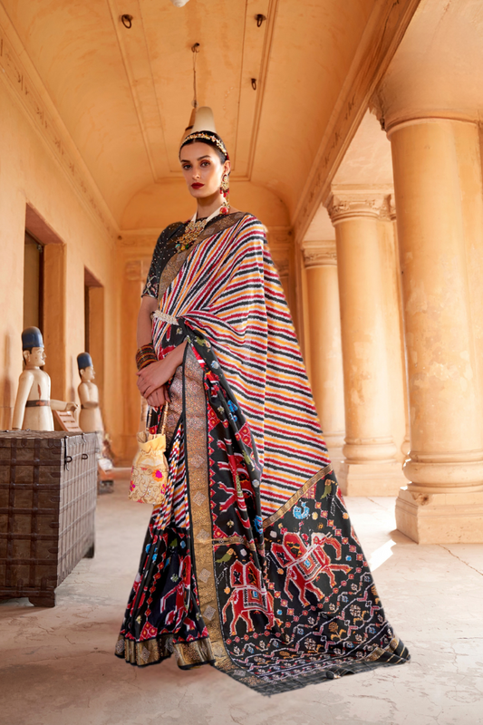 Artisanal Patola Silk Saree with Elegant Tassel Touch