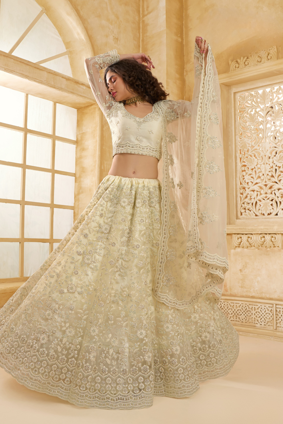 Elegant Cream Net Lehenga Choli Featuring Thread Work