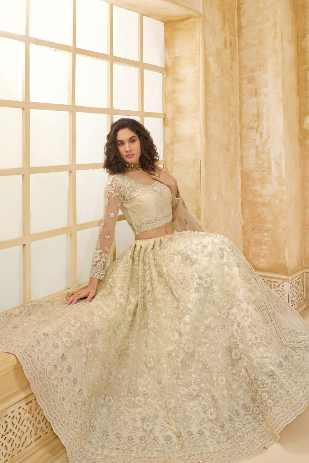 Elegant Cream Net Lehenga Choli Featuring Thread Work