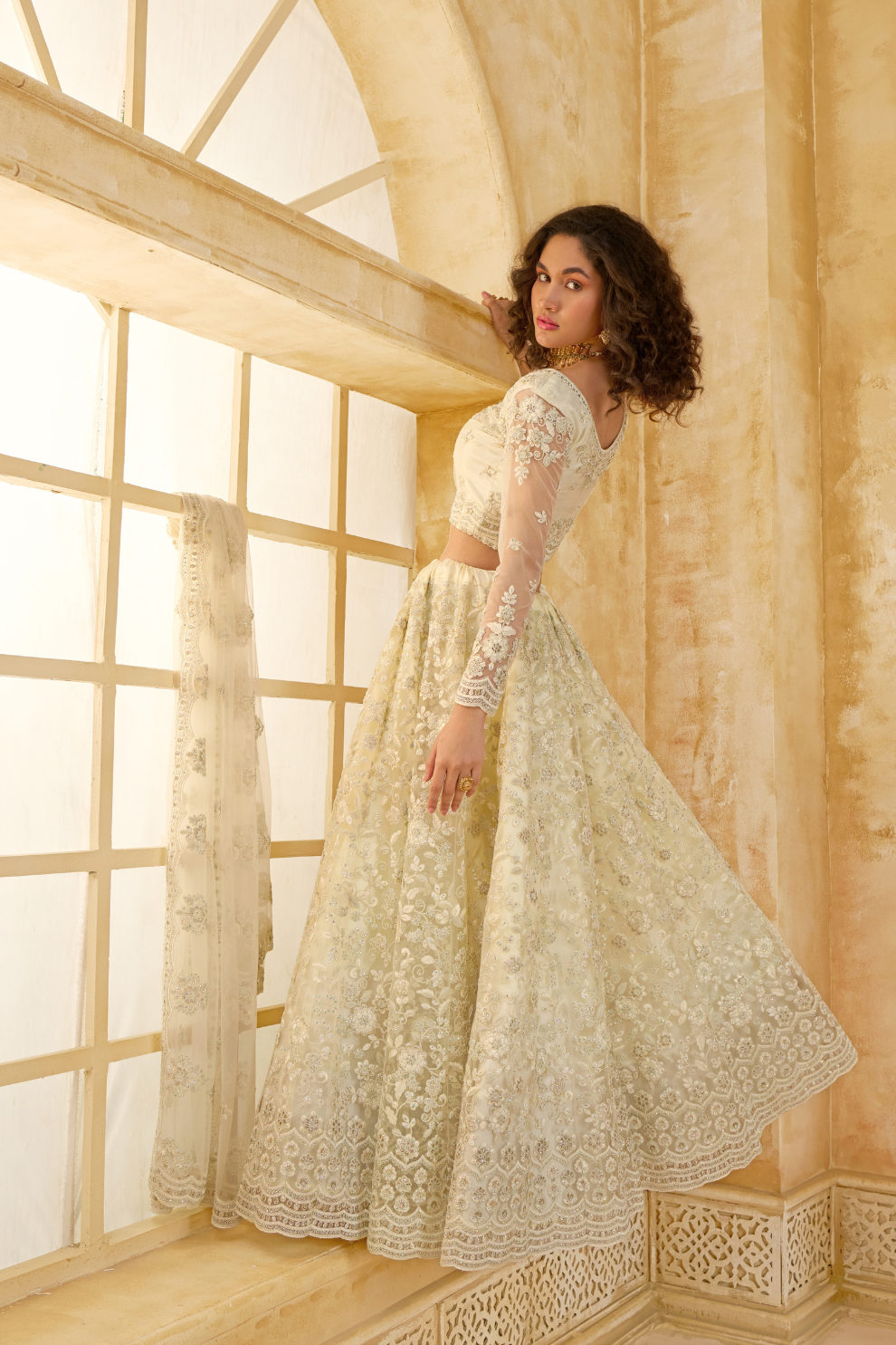 Elegant Cream Net Lehenga Choli Featuring Thread Work