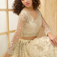 Elegant Cream Net Lehenga Choli Featuring Thread Work