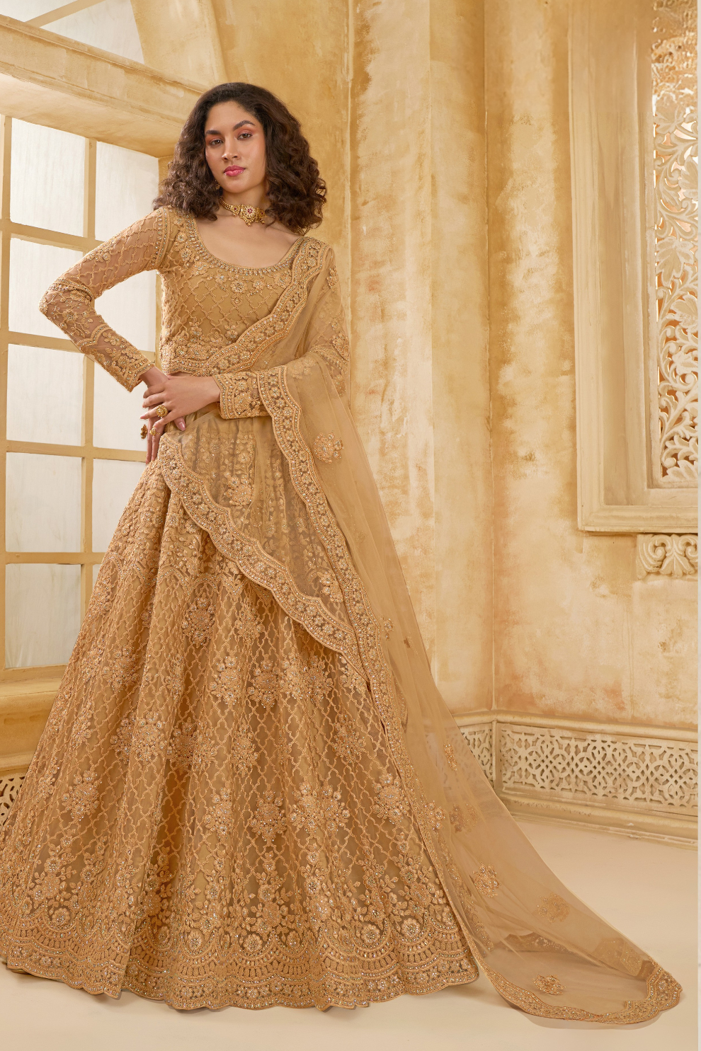 Golden Heavy Embroidered Net Lehenga Choli With Dupatta