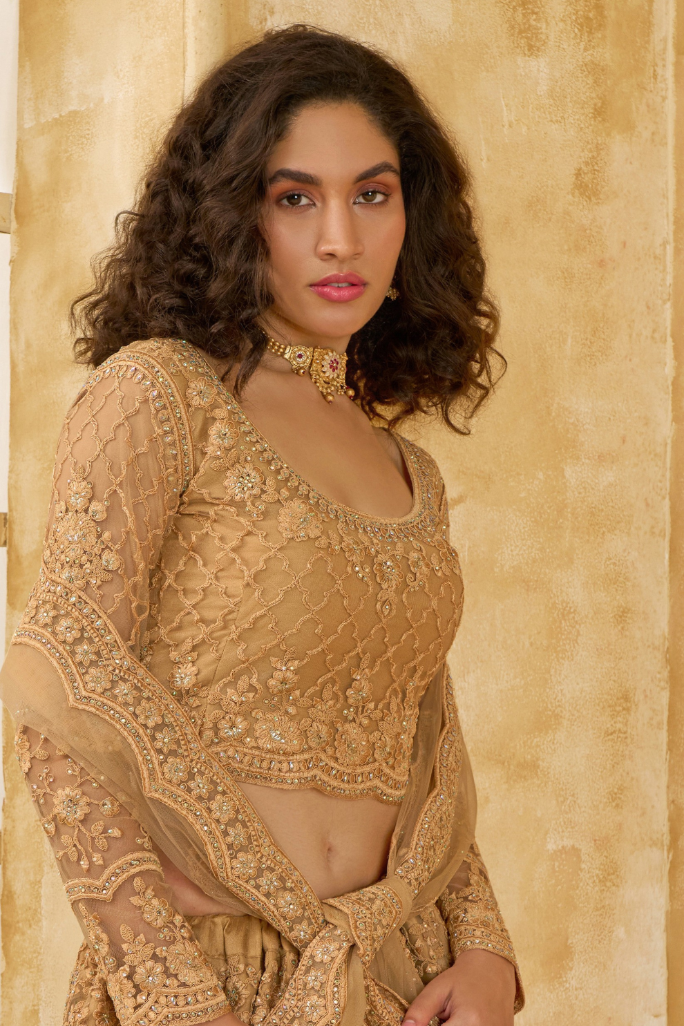 Golden Heavy Embroidered Net Lehenga Choli With Dupatta