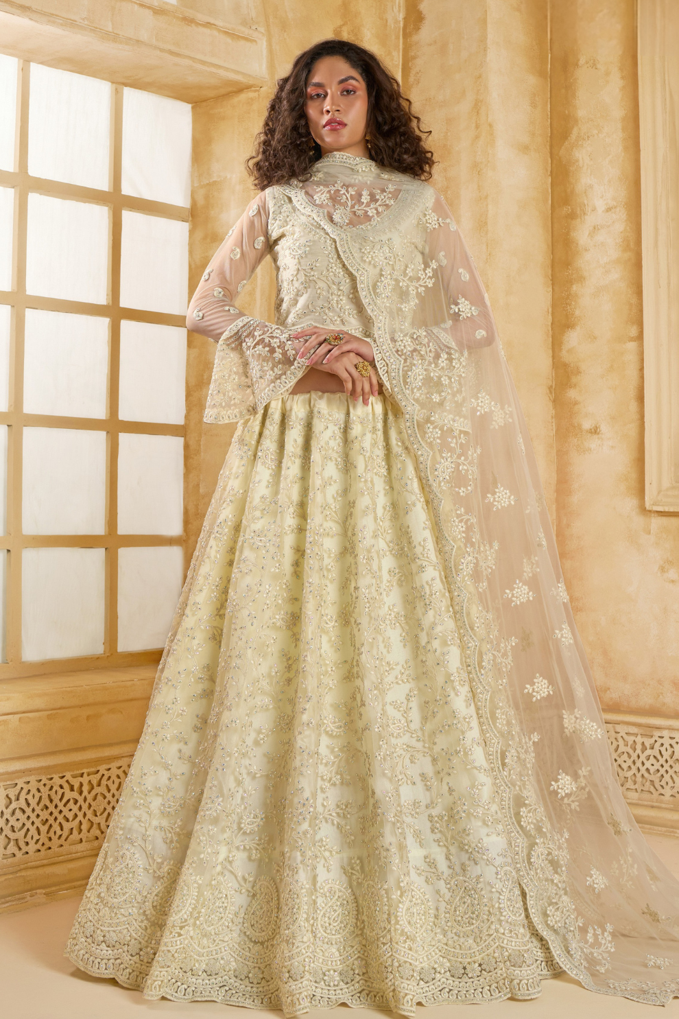 Graceful Cream Net Lehenga Choli For Weddings And Parties