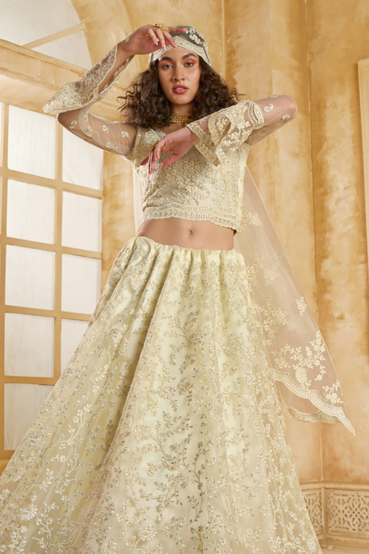 Graceful Cream Net Lehenga Choli For Weddings And Parties