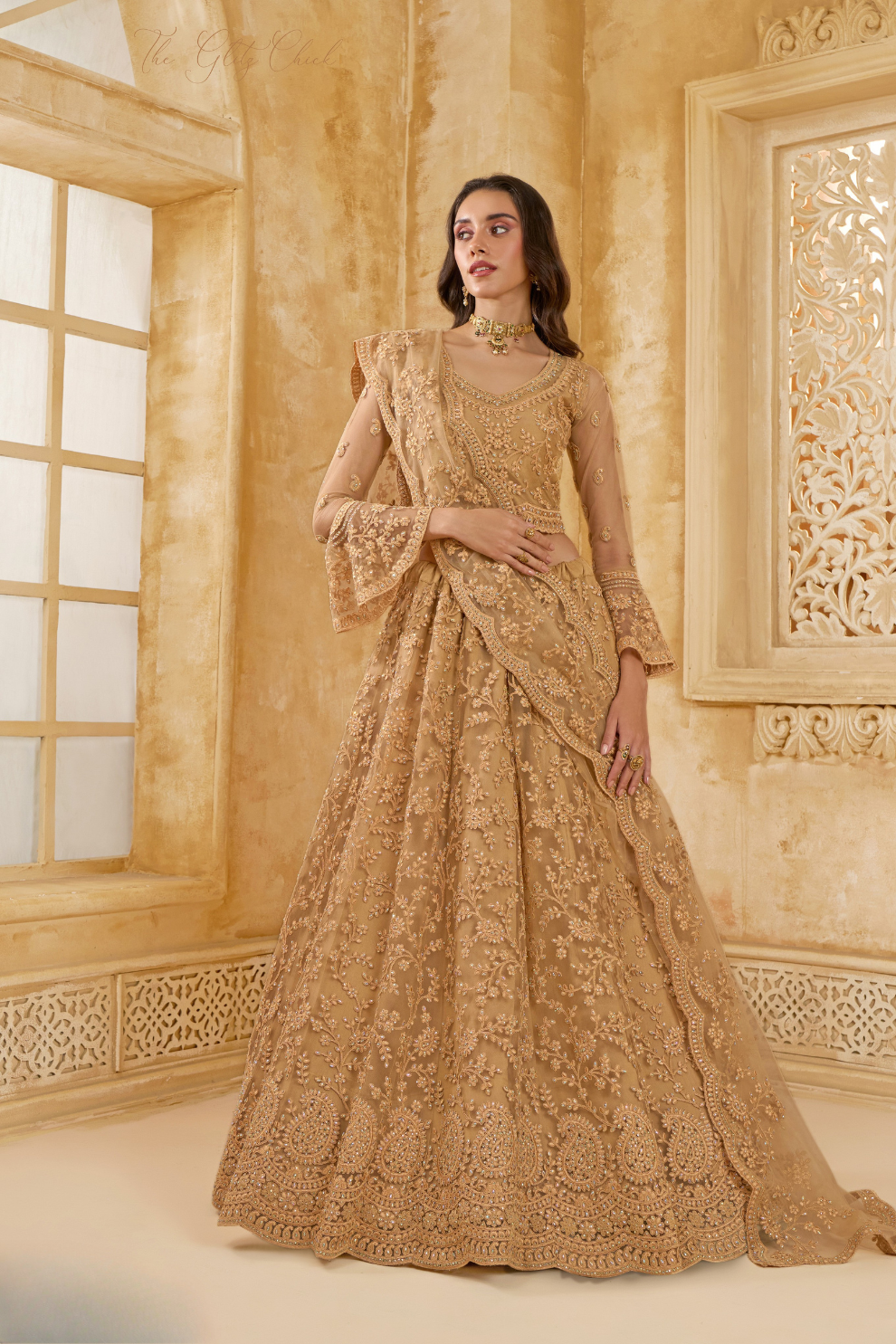 Golden Heavy Embroidered Net Lehenga Choli With Dupatta