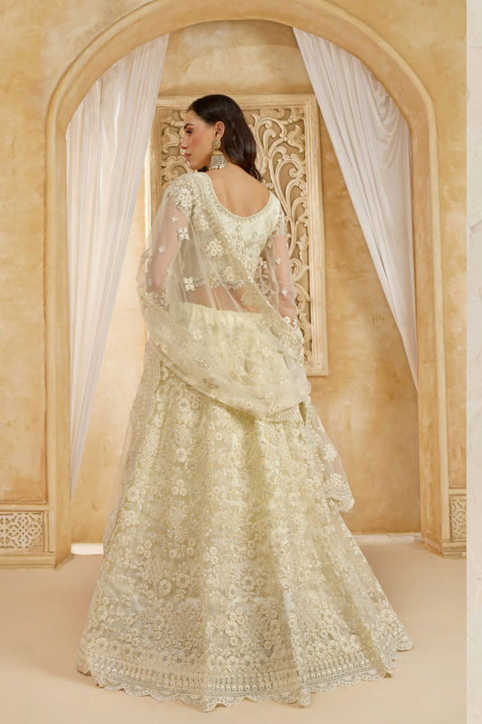 Soft Cream Net Lehenga Choli With Opulent Bridal Embroidery