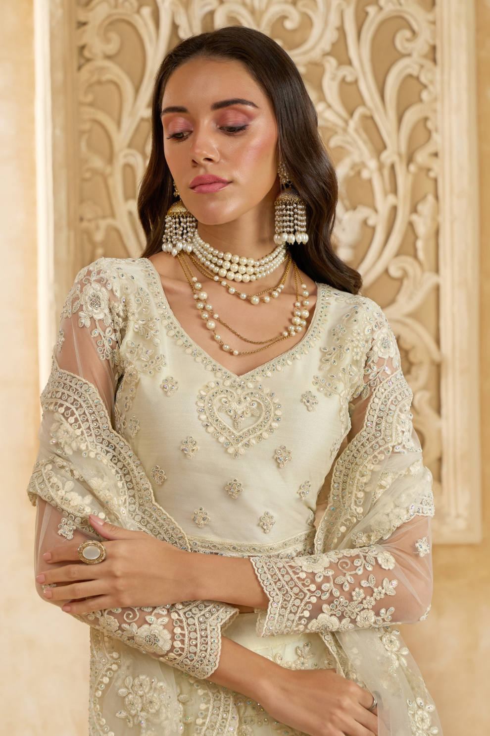 Soft Cream Net Lehenga Choli With Opulent Bridal Embroidery