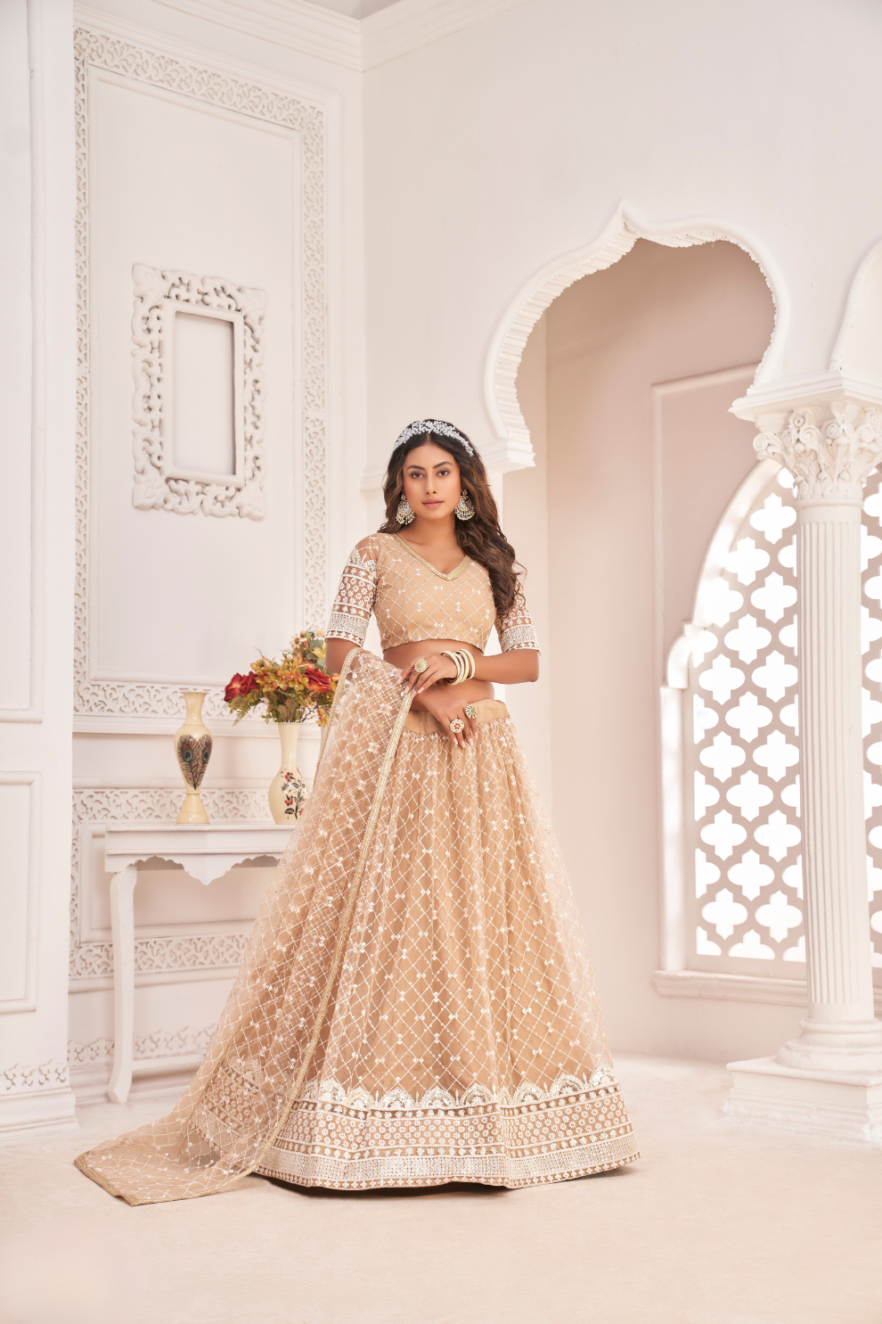 Elegant Net Lehenga Choli with Intricate Thread Embroidery