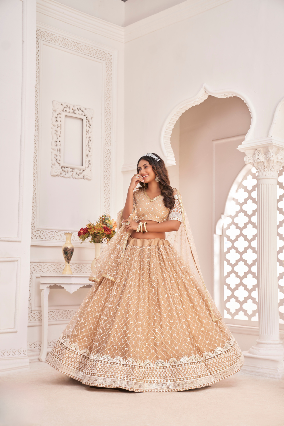 Elegant Net Lehenga Choli with Intricate Thread Embroidery